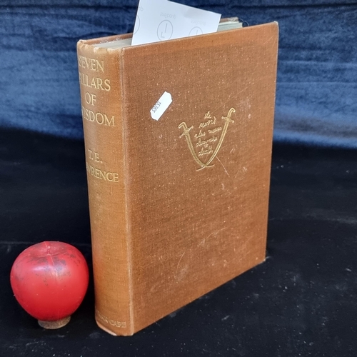 98 - A vintage book titled 'Seven Pillars of Wisdom A Triumph' by T.E. Lawrence. Published in 1935 by Jon... 