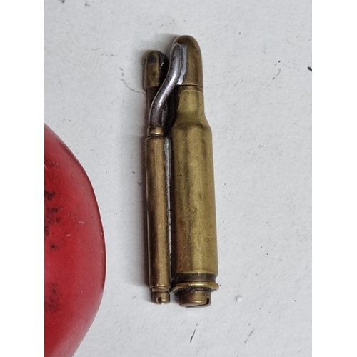 512 - A fantastic piece of trench art of bullet converted into a lighter.