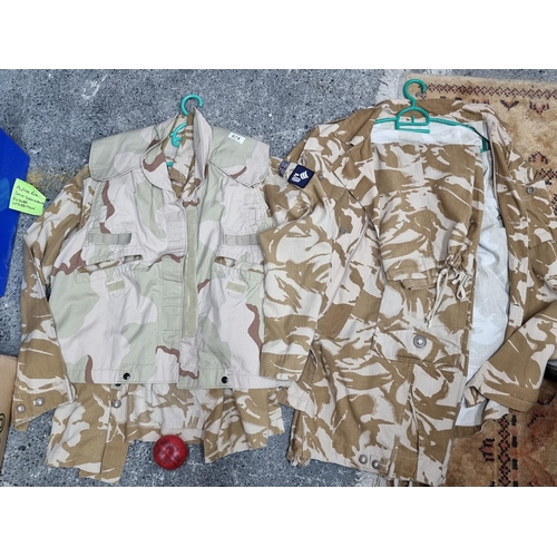 674 - Two British military camo uniforms including a vest, shirts and a pair of trousers. One shirt has tw... 