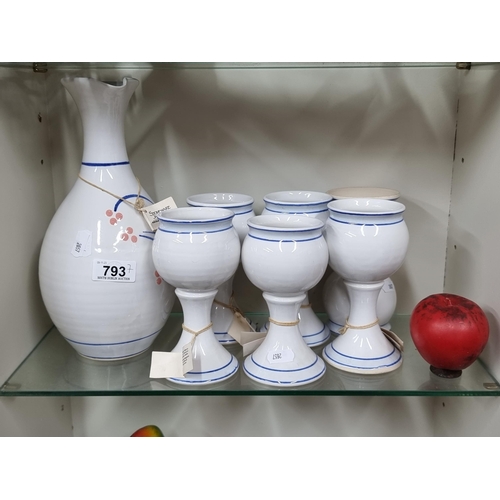 793 - Seven pieces of Stoneware Jackson studio Pottery including six drinking cups and and a large pouring... 