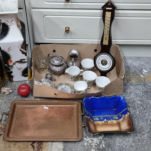 799 - A mixed lot of vintage items including a beautiful hammered copper tray and wooden barometer, some m... 