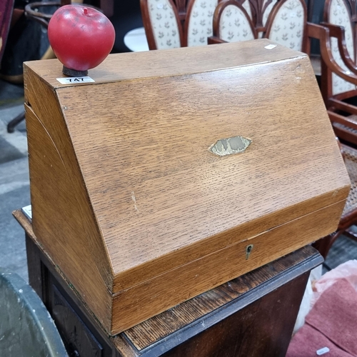 747 - A beautiful antique Victorian walnut stationary box with letter rack. With original key and boasting... 