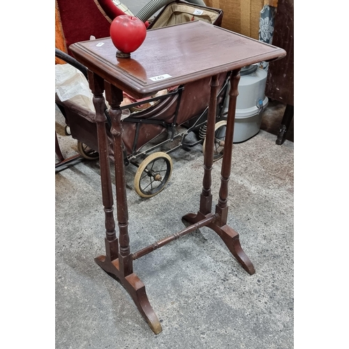 749 - An elegant antique plant stand with turned supports. From a very fine home just sold in Dun Laoghair... 