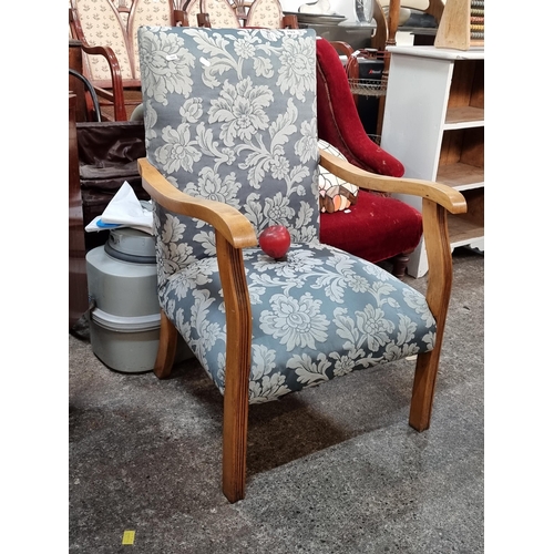 753 - A lovely vintage armchair with turquoise damask upholstery and carved armrests. From a very fine hom... 