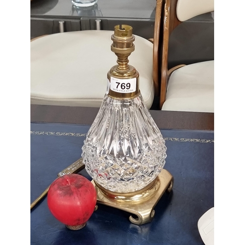 769 - Star Lot : A gorgeous Water Crystal table lamp with a pear shaped bass and brass fittings. Fitted wi... 