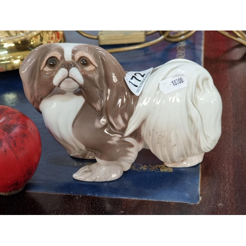 772 - An adorable Royal Copenhagen, Denmark porcelain figure of a Pekingese dog in very good condition.