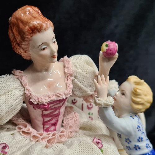 285 - Star Lot: A gorgeous very large Irish Dresden porcelain figure of 'Mother and Children' featuring th... 