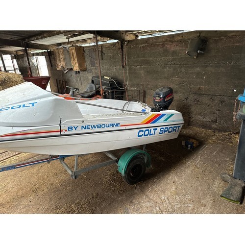 1035 - Star Lot : A Colt Sport 11ft boat By New Bourne with an Evinrude 9 HP outboard motor. With the trail... 