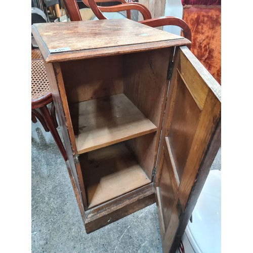 748 - A charming vintage oak pot cupboard. intricate floral carving and shelf to interior.From a very fine... 