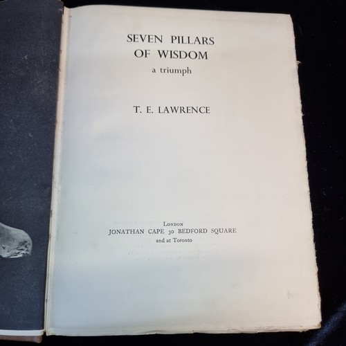 98 - A vintage book titled 'Seven Pillars of Wisdom A Triumph' by T.E. Lawrence. Published in 1935 by Jon... 