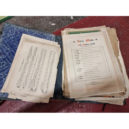 183 - A large collection of antique sheet music including Irish examples, one lot housed in a leather suit... 