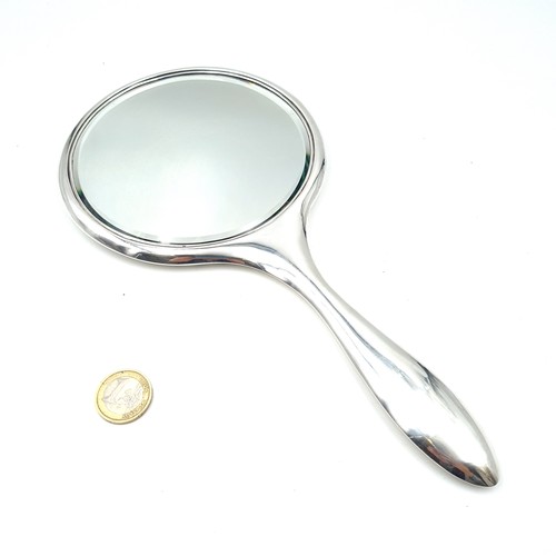 44 - A beautiful Art Deco Sterling Silver  hand Mirror, with sterling silver back hallmarked Birmingham 1... 