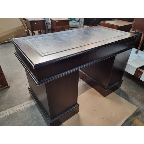 771 - Star Lot : A very handsome Victorian style desk with navy ltooled eather top, 6 drawers and a false ... 