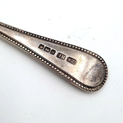 20 - A collection of 3 items consisting of a Sterling Silver Teaspoon hallmarked Birmingham, length 15cm,... 