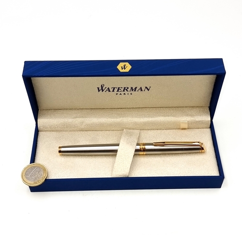 An exquisite Waterman Paris Ballpoint pen, contemporary, featuring brushed chrome accents with gold metal detailing, complete with original case, showcasing excellent craftsmanship. Pen requires refill.