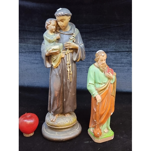 122 - Two vintage  figures of religious interest including one depicting St. Anthony of Padua and another ... 