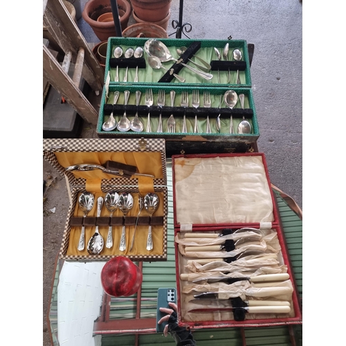 Three complete boxes of vintage EPNS cutlery.