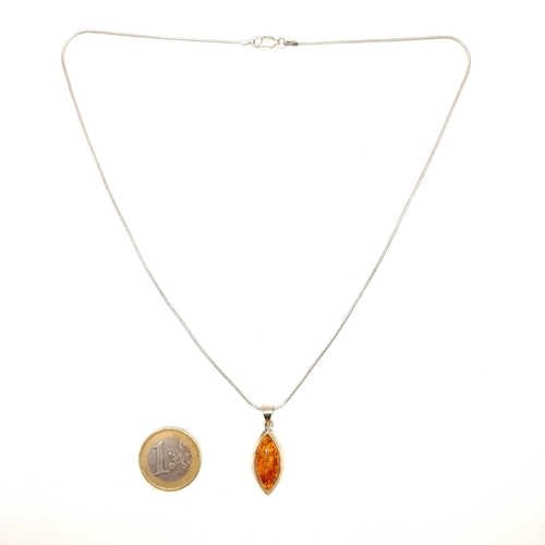 935 - A baltic amber sterling silver Pendant and chain, length 44cm. Lovely colour play and inclusions in ... 