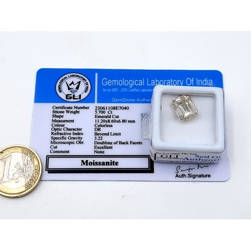 969 - A beautiful 5.700ct Moissanite gem stone in the emerald cut. Comes with the GLI certificate and case... 