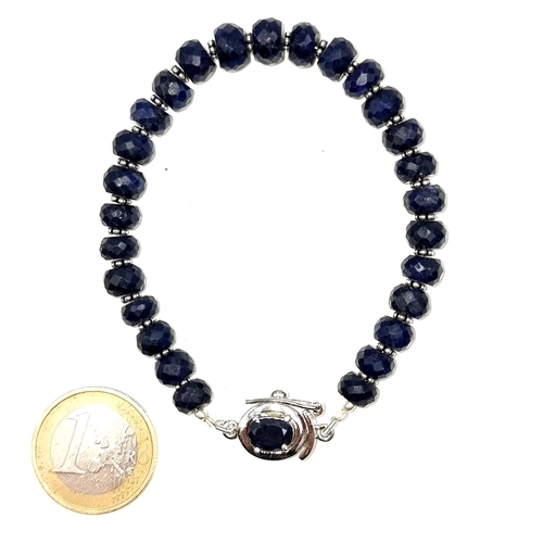 975 - A fabulous Sapphire  sterling silver (stamped 925) gem set bracelet with unusual open box clasp. All... 