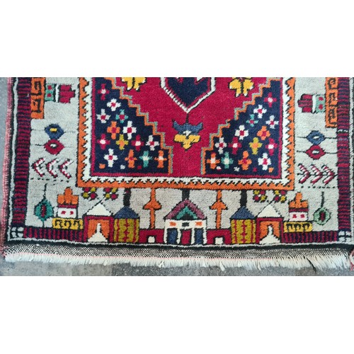 931 - Star Lot : A gorgeous hand knotted woolen hall runner rug featuring an attractive town scape pattern... 