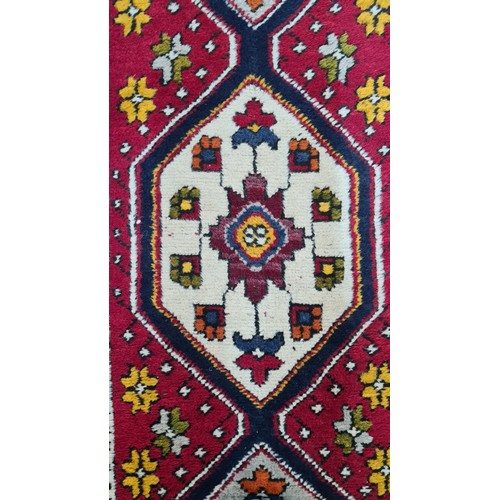 931 - Star Lot : A gorgeous hand knotted woolen hall runner rug featuring an attractive town scape pattern... 