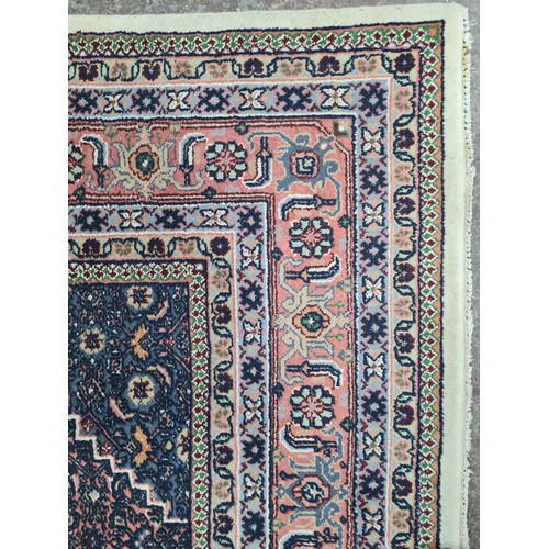 933 - An exquisite hand knotted Persian style woolen rug featuring a rich tapestry of an intricately Star ... 