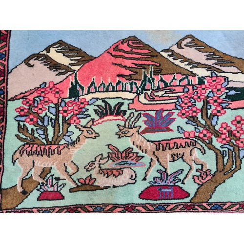 934 - Star Lot : A super sweet hand knotted woolen door mat / rug featuring a lovely mountainscape scene w... 