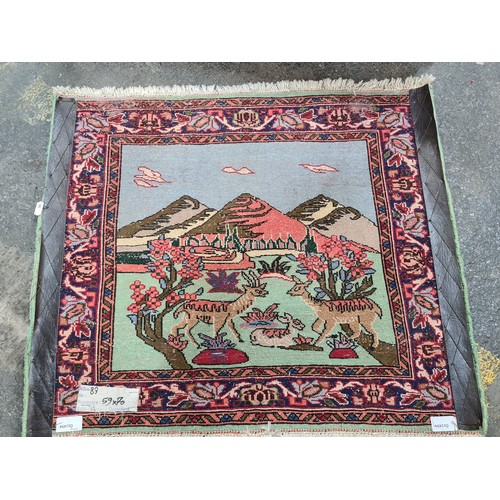 934 - Star Lot : A super sweet hand knotted woolen door mat / rug featuring a lovely mountainscape scene w... 