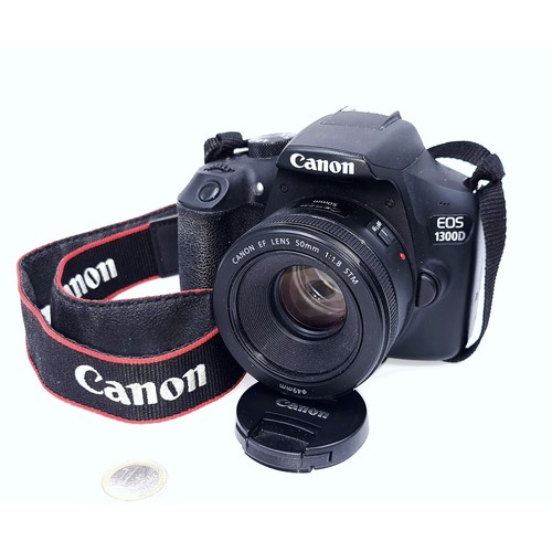 287 - Star Lot : Professional standard, high quality Canon EOS 1300D camera. Comes complete with a 50mm le... 