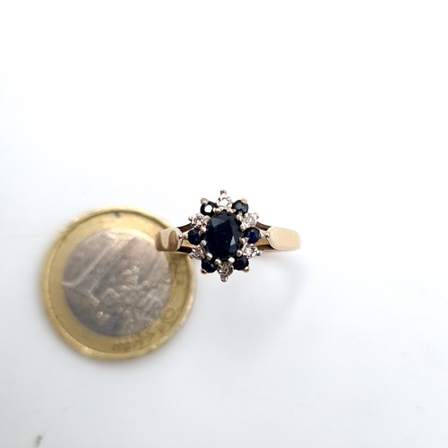 12 - Star Lot : An exquisite vintage sapphire and diamond ring, crafted from 9K gold the central deep blu... 