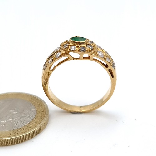 458 - An impressive gold tone dress Ring set with assorted gem stone setting. Size O, weight 4.24gms