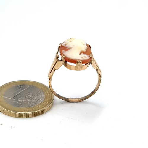 940 - A very attractive 9k gold Cameo Ring with a broad banded mount, size Q, weight 2.71gms. Boxed.