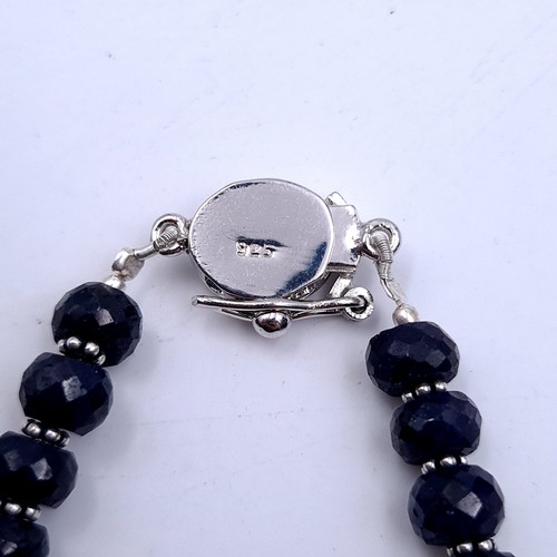 975 - A fabulous Sapphire  sterling silver (stamped 925) gem set bracelet with unusual open box clasp. All... 