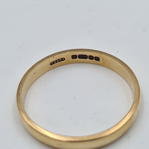 988 - Super 9ct Gold fully hallmarked god band. 
1.4g size M