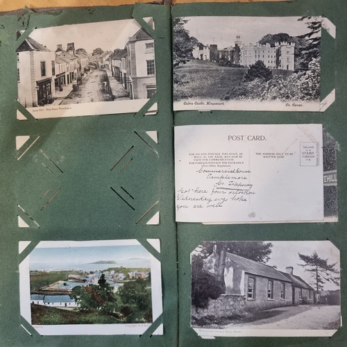 204 - A captivating Victorian album containing approx. 137 fantastic postcards including Irish sites from ... 