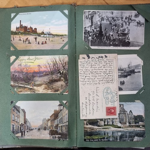 204 - A captivating Victorian album containing approx. 137 fantastic postcards including Irish sites from ... 