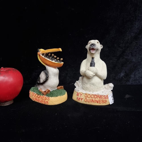 200 - A nostalgic pair of Guinness advertising figurines, featuring the iconic toucan and polar bear. A de... 