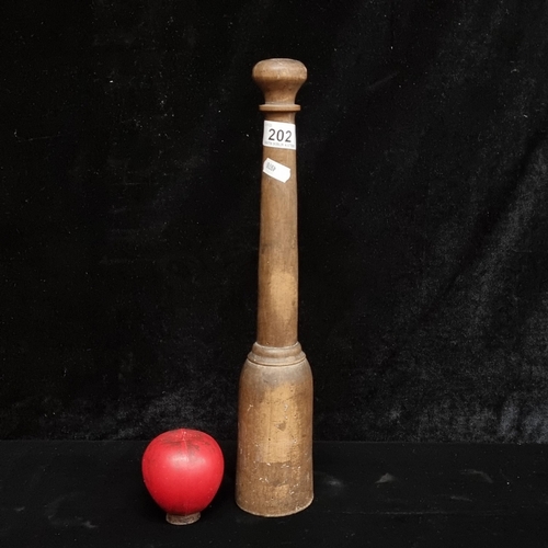 202 - A large 19th century French antique wooden pestle.