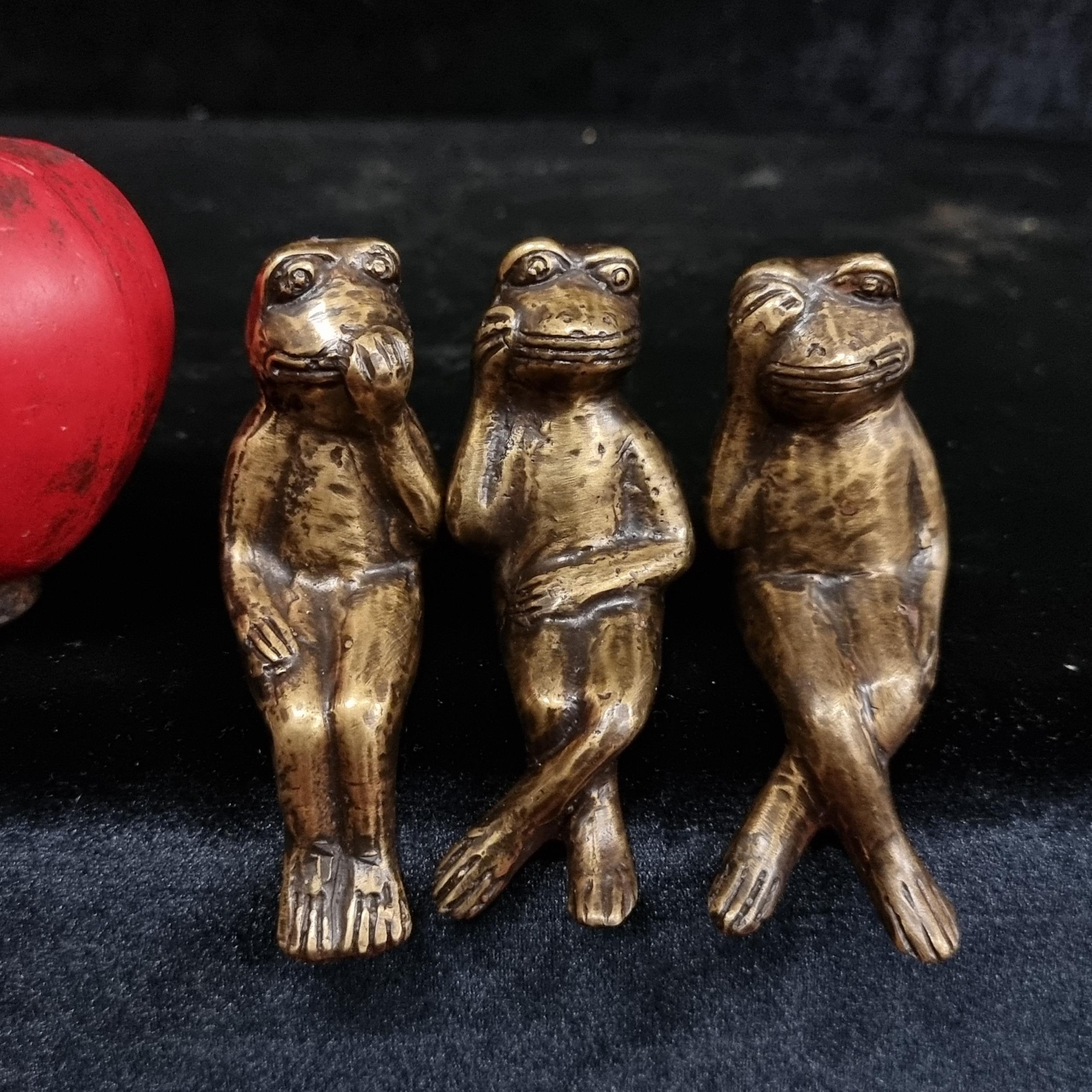 Ornate bronze frogs depicting the whimsical trio of 'See no evil, Hear ...