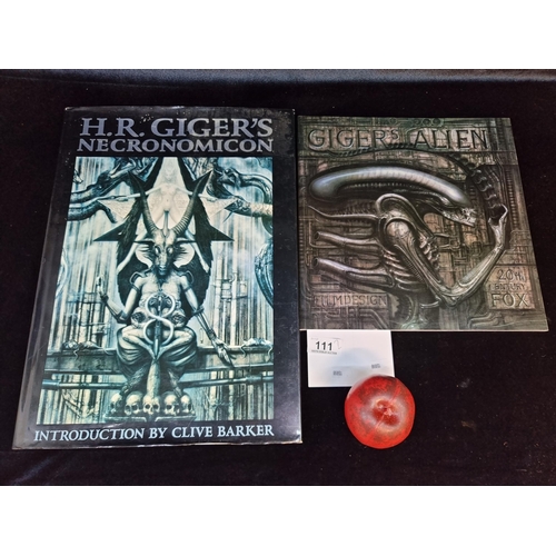 111 - Two books on the works of H.R. Giger's including a large hardback book titled 'Necronomicon' and 'Al... 