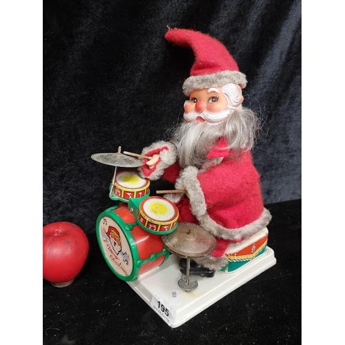 195 - An adorable vintage Stene battery operated musical Christmas decoration.