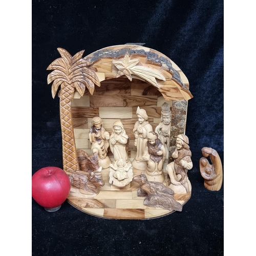 199 - A charming Palestinian Khano Bros handmade olive wood nativity set. Marked on the back Palestine Kha... 