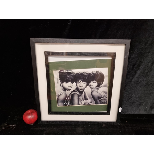 87 - A fab print of a black and white photograph of the Supremes. Housed in a black box frame.