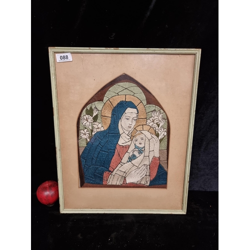 88 - A serene vintage framed embroidery artwork featuring a Madonna and child. Completed in a satin stitc... 