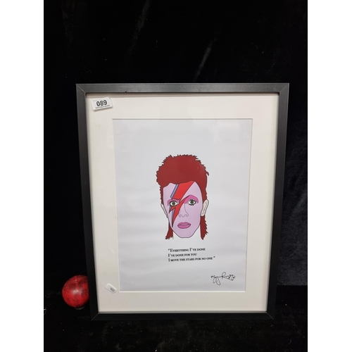 89 - A graphic print of a David Bowie portrait and quote. Housed in a contemporary black frame.