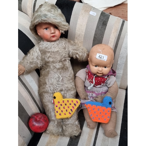 421 - Two charming vintage dolls c.1940s including one from Plastey with a ceramic head, soft body and cro... 