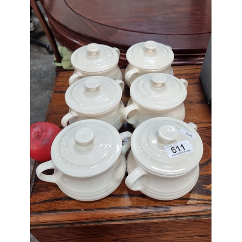 A set of charming Le Creuset 0.5L baking dishes/soup bowls with lids. In a cream finish. Very good condition.