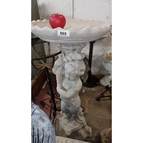 665 - Star Lot : An elegant and very heavy reconstituted stone garden bird bath / feeder, with cherub to b... 