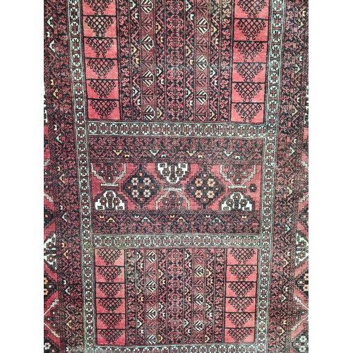 950 - Star lot : A fabulous hand knotted woolen Persian style rug with an intricate geometric pattern in w... 